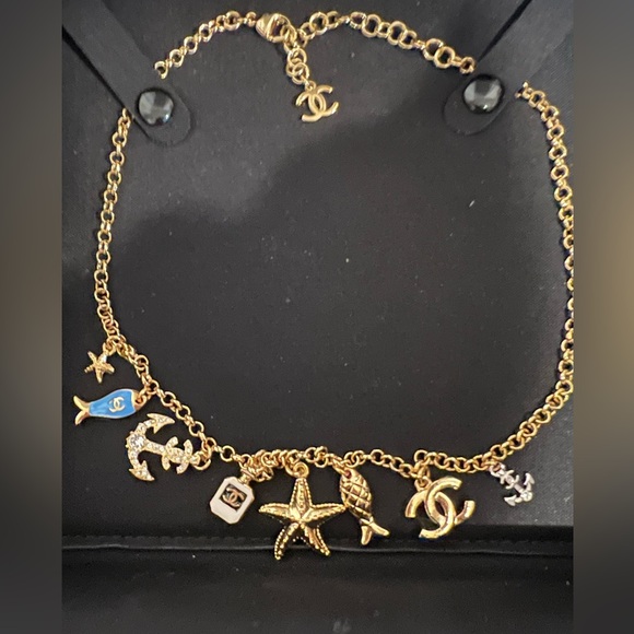 CHANEL Jewelry - Chanel charm necklace from 25C cruise